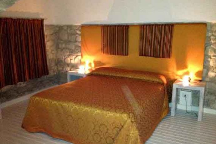 Comfortable bed in our Sicilian villa.