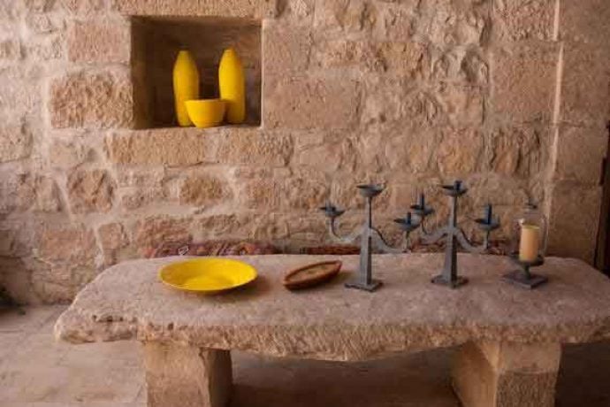 Stone table and stone bench with decoration in villa.