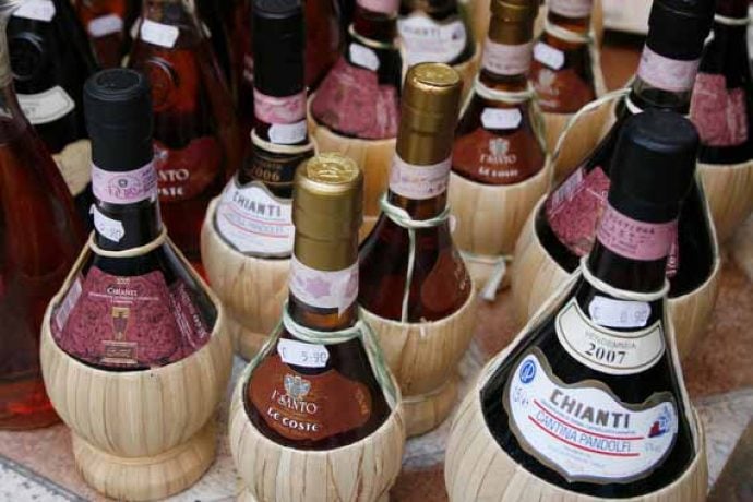Bottles of Chianti with straw fiasco