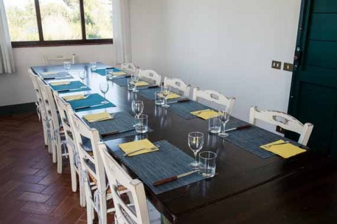Table ready for cooking guests to eat dinner prepared during course.