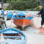 local fisherman with his boats at the Amalfi coast