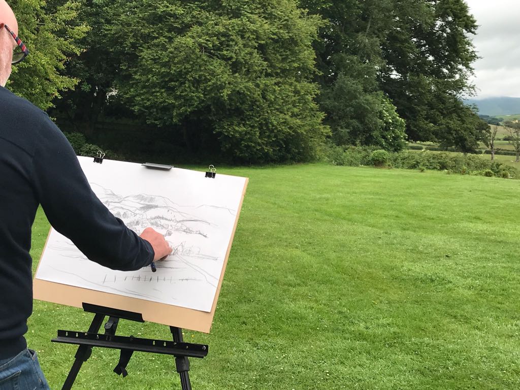 Hugh Tuckerman preparing a painting outside