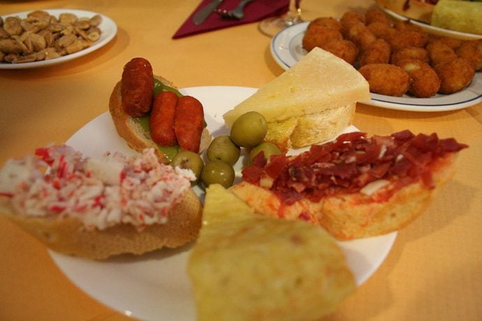 plate of Tapas marteñas with cheese, salami, and olives