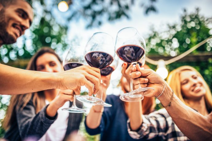 Group of friends with red wine