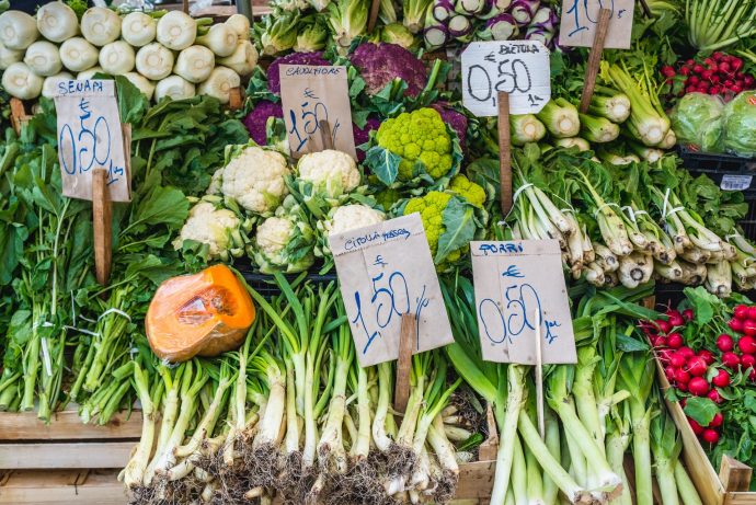 Seasonal vegetables laid out at Italian market