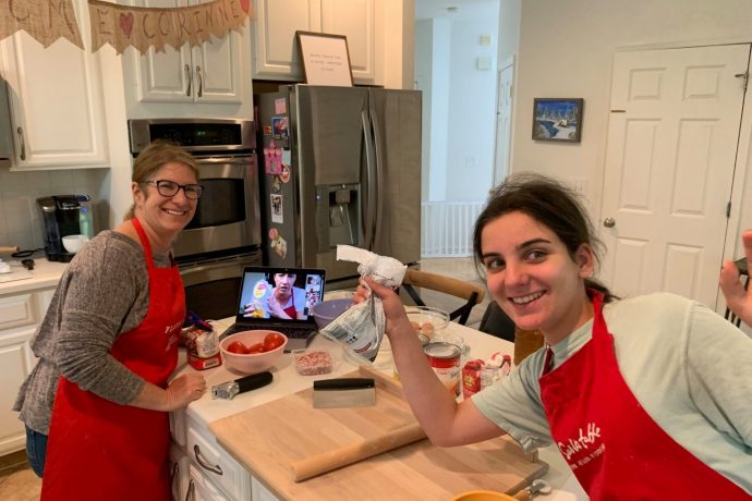 Mother and daughter ready for an online cooking course